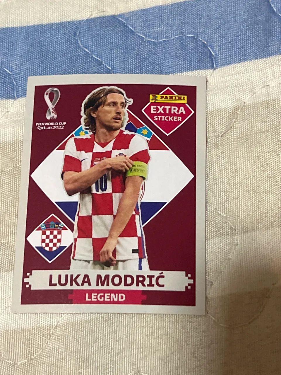 Figurinha legend do Luka Modric de 2022 bordô