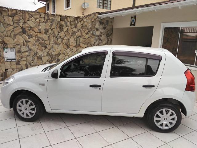 Sandero 2013 expression 1.0,impecável,90mkm,pneus novos,manual e chave copia - Foto 16