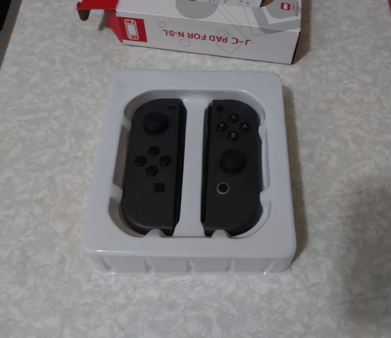Joy-con cinza paralelo