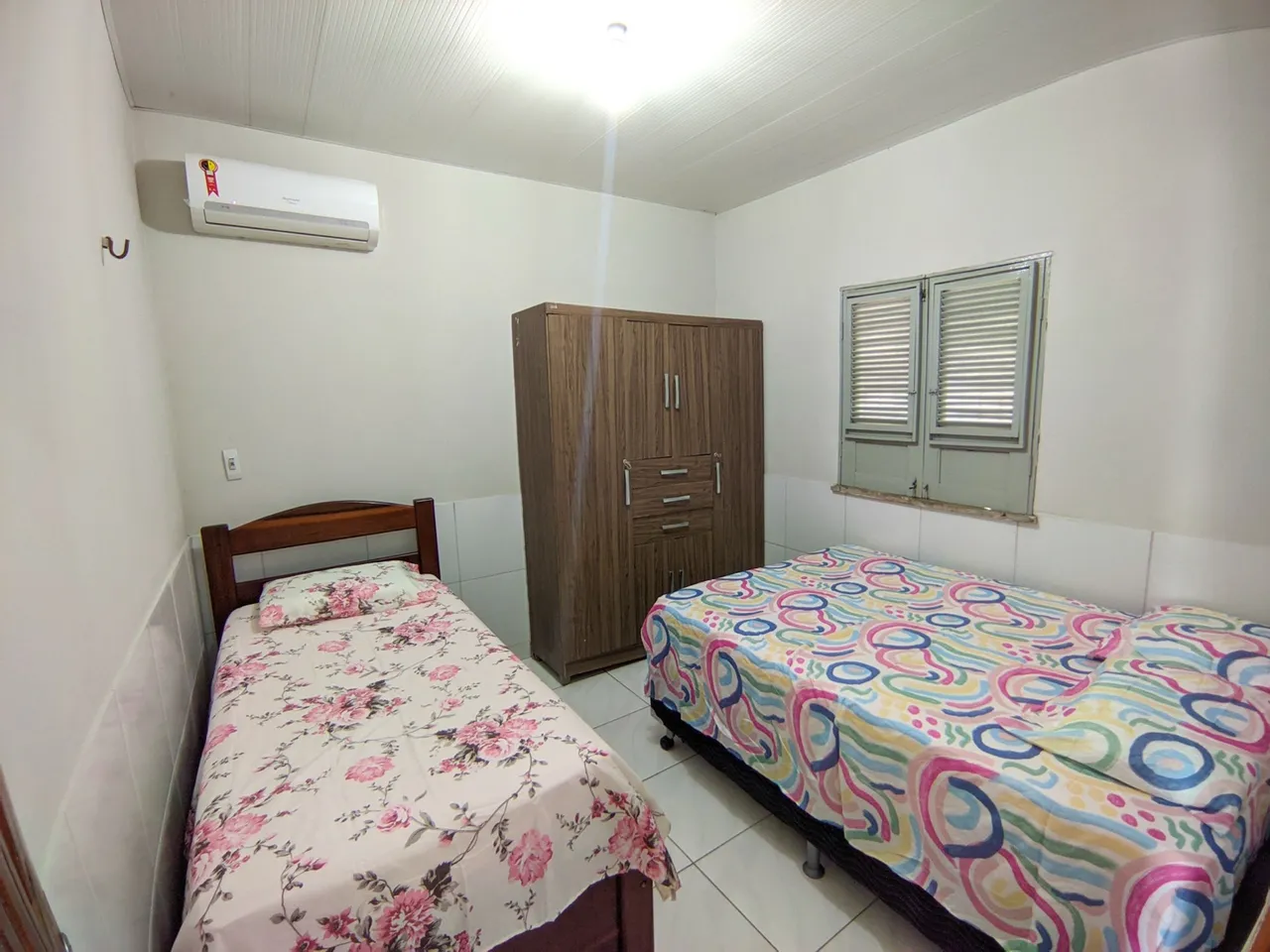 Temporada em casa aconchegante com 2 quartos