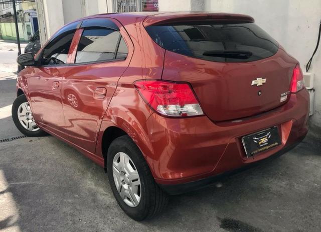 GM Onix LT entrada + 549,00 parcelas fixas - Foto 6