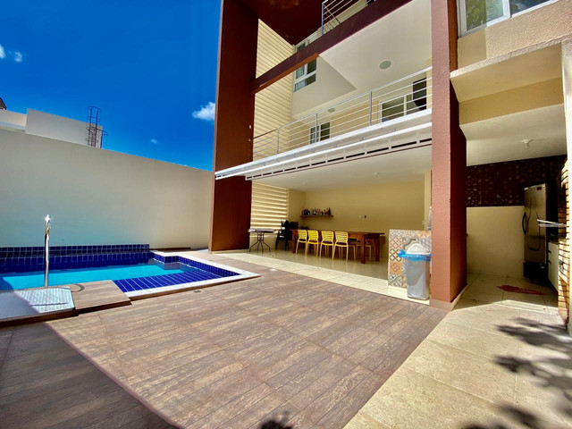 Casa com 4/4 , piscina com espaço gourmet, varanda - Foto 3