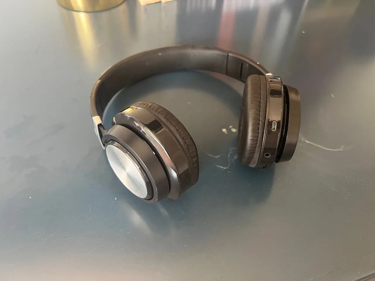 Phone de ouvido com rádio 