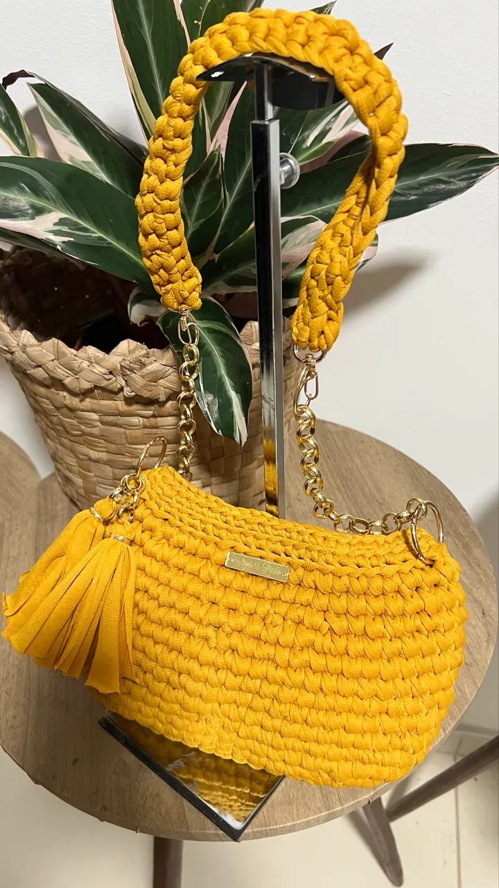 Vendo bolsa fio de malha 75,00