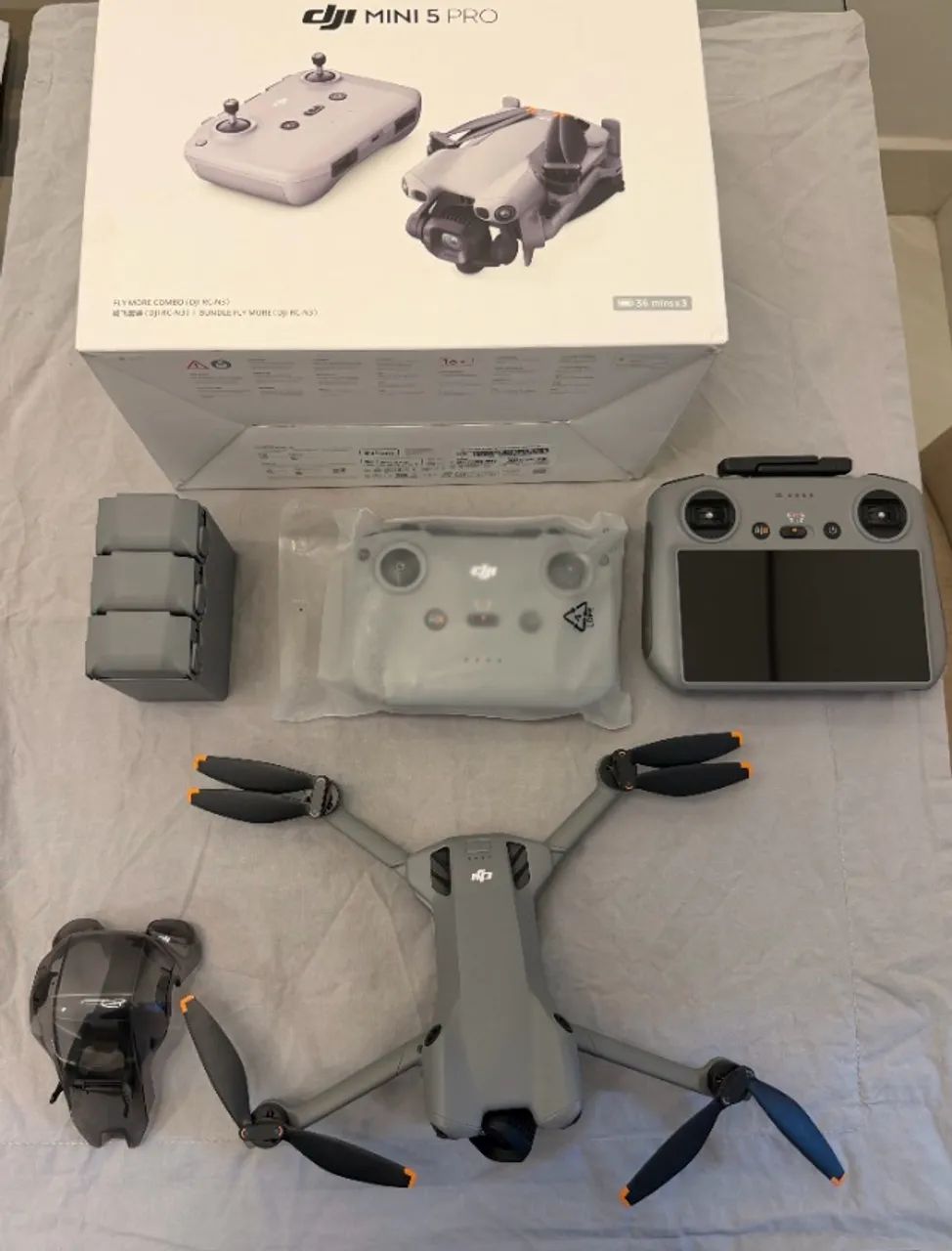 Drone Dji Mini 5 Pro Fly More 4K Controle c/ Tela