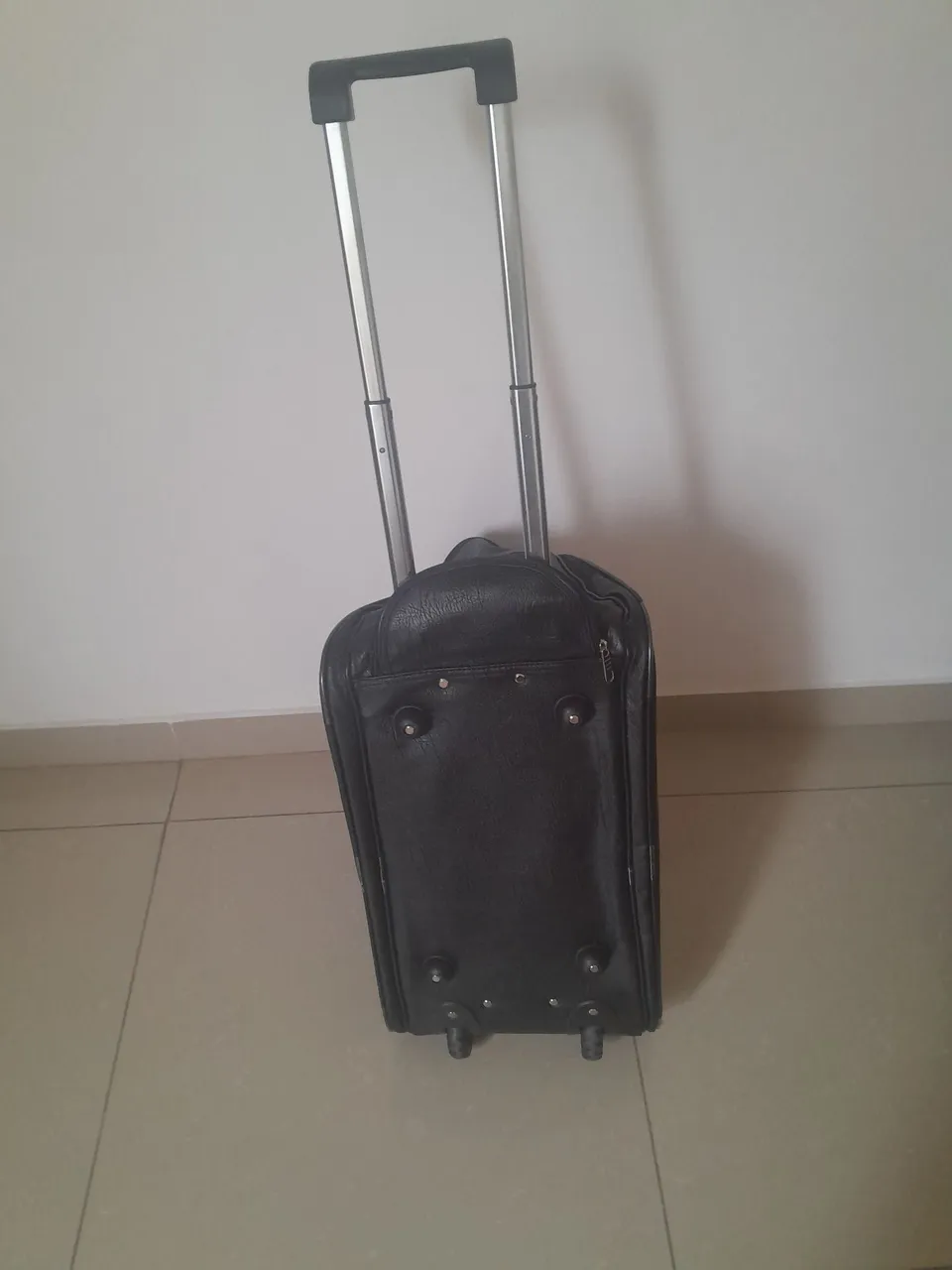 Mala de viagem com rodinhas e puxador retrátil