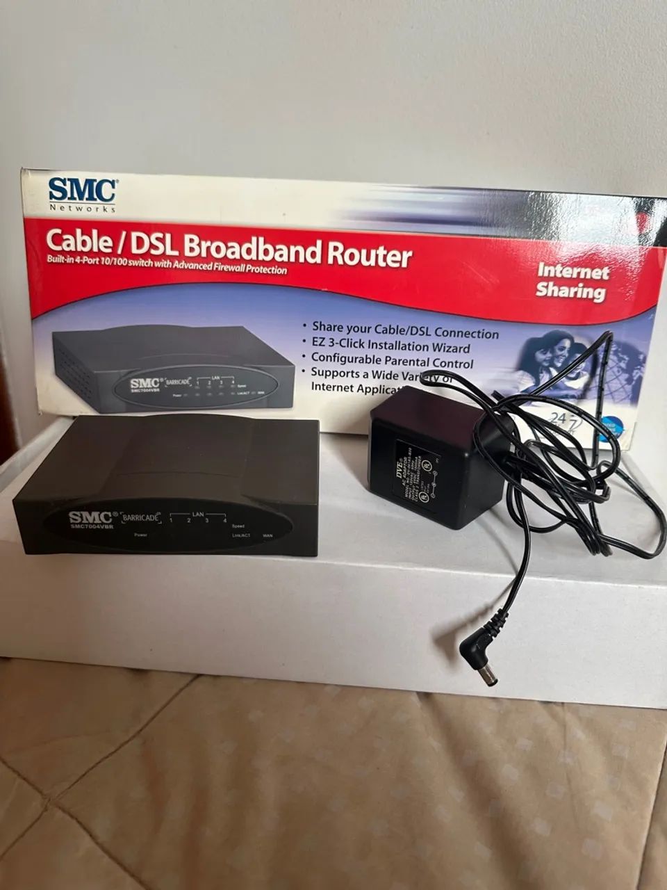 roteador SMC SMC7004VBR 4 portas 10/100 com proteção firewall