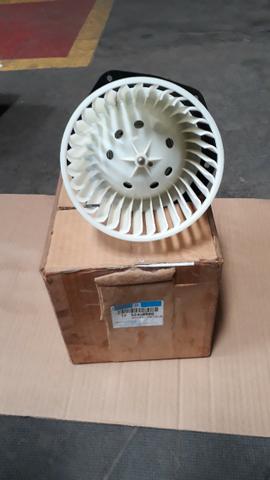 52498980 Motor elétrico com ventoinha S10