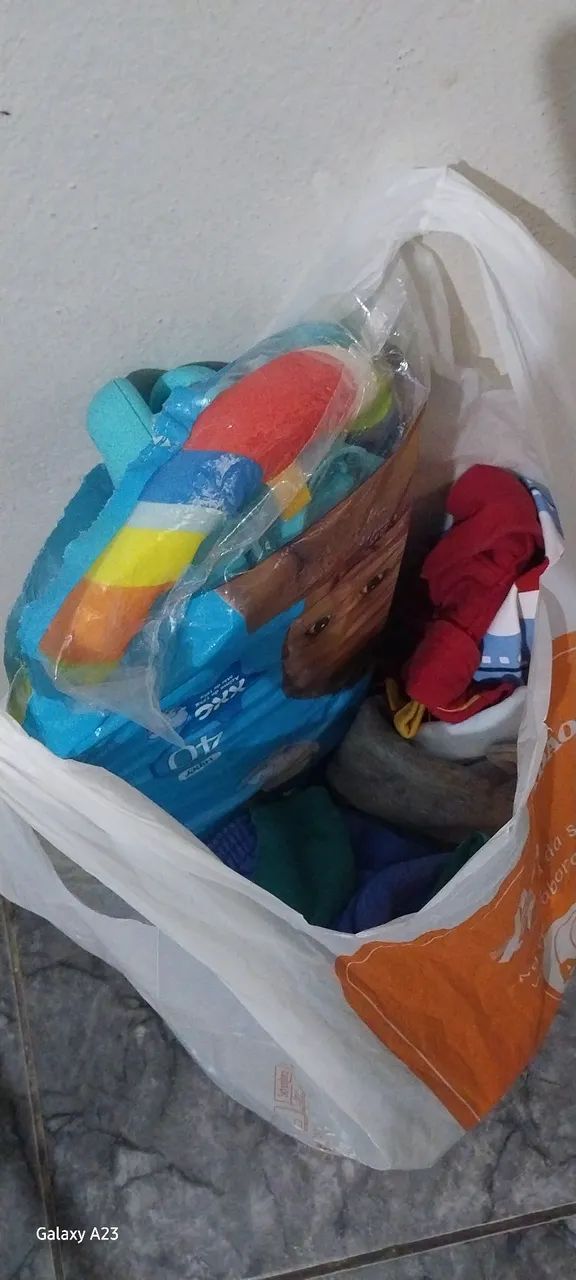 Clothes and an activity mat.. 64166868809730121