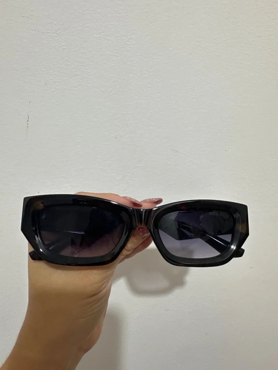 Óculos miumiu 