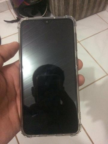 Vendo celular a10 novo com capinha e película