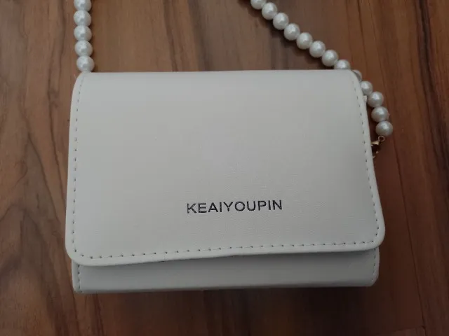 Linda bolsa pérolas casual novinha