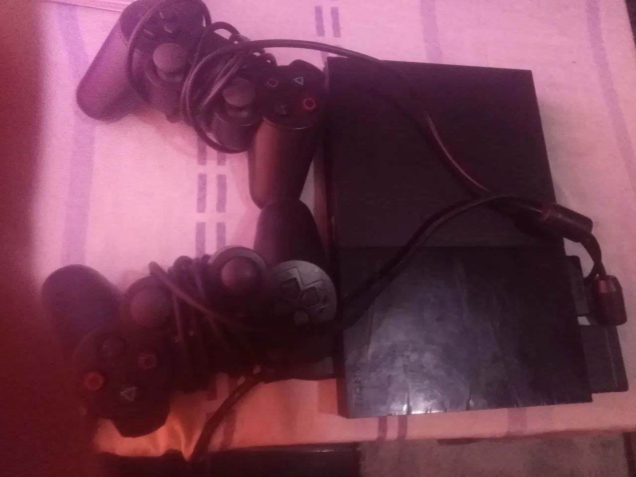 Vendo Playstation 2 sem nenhum detalhe com 2 controles e 8 jogos funciona perfeitamente  - Foto 2