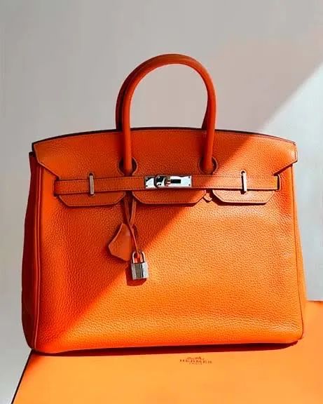 Bolsa couro em grife 