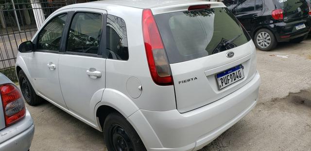 Fiesta hatch 2014 1.0 completo bom pra uber - Foto 3