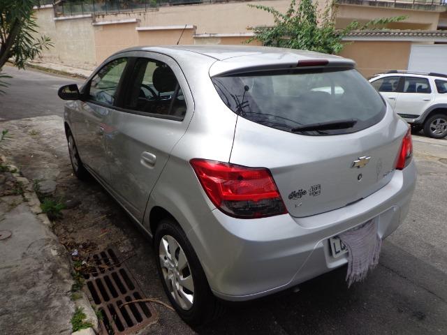 Onix 2013 lt 1.4 única dona - Foto 9