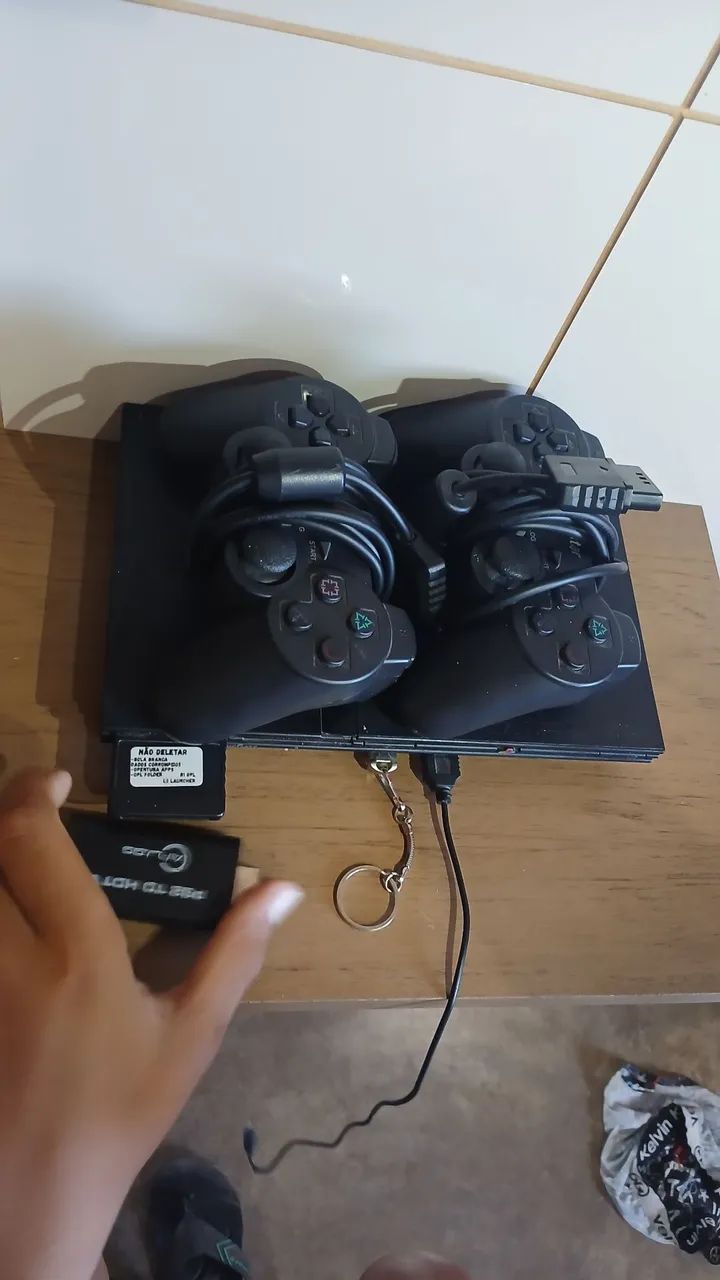 Ps2 desbloqueado com 2 controle e 60 jogos - Foto 2