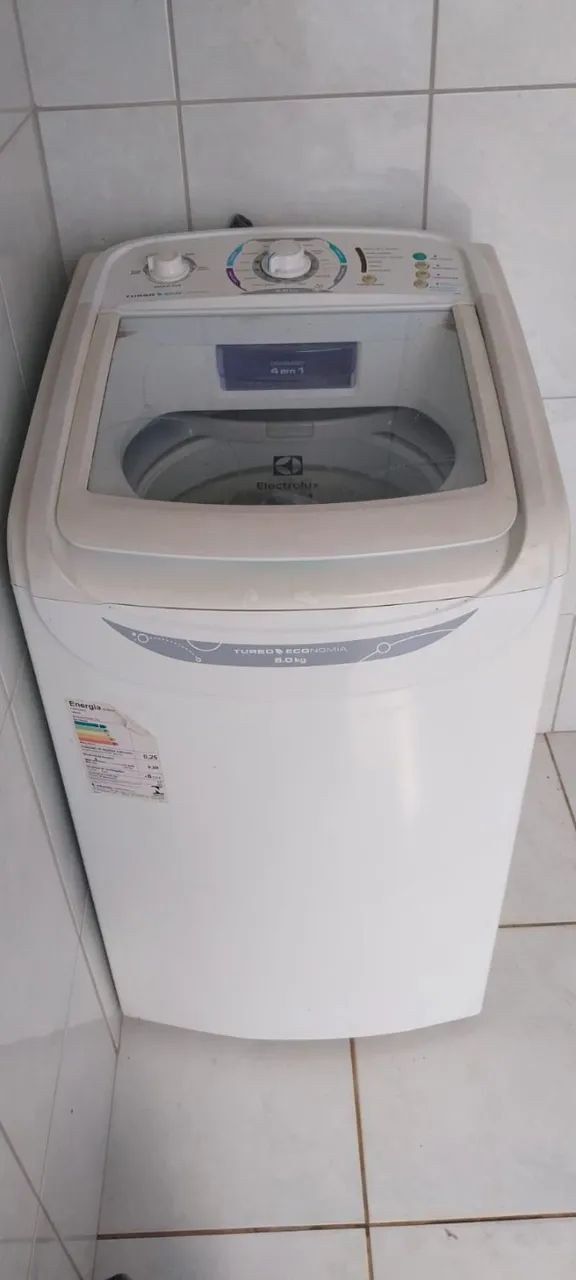 Máquina de lavar roupa com defeito