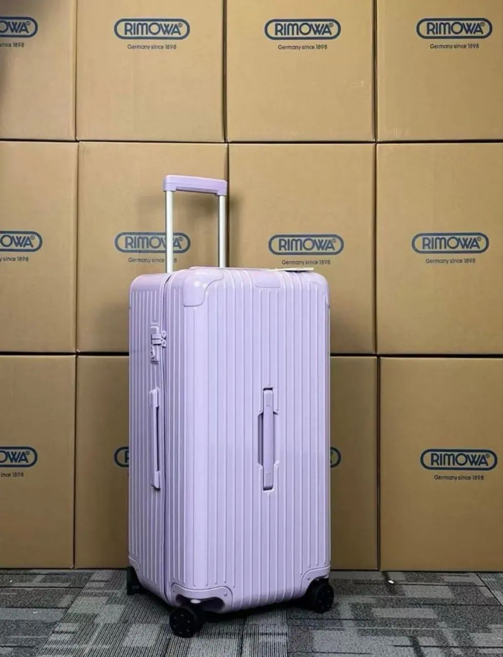 Rimowa trunk plus lilás