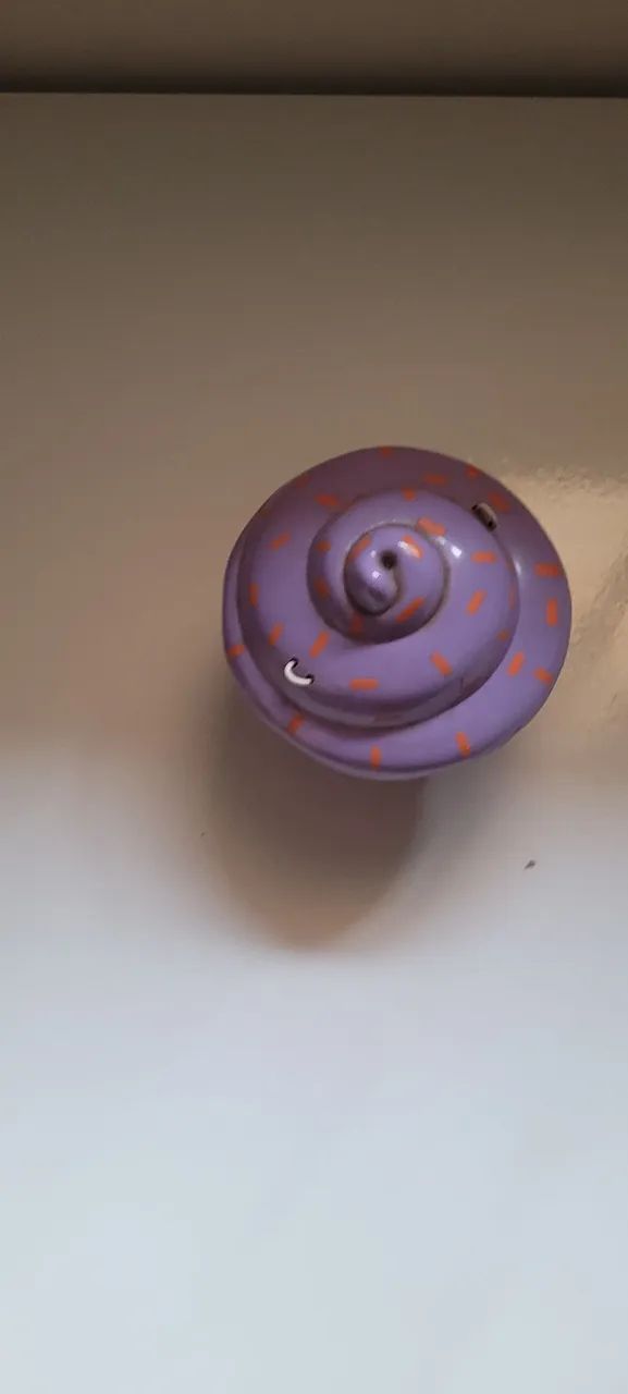 Boneca que vira cupcake roxo da estrela - Foto 4
