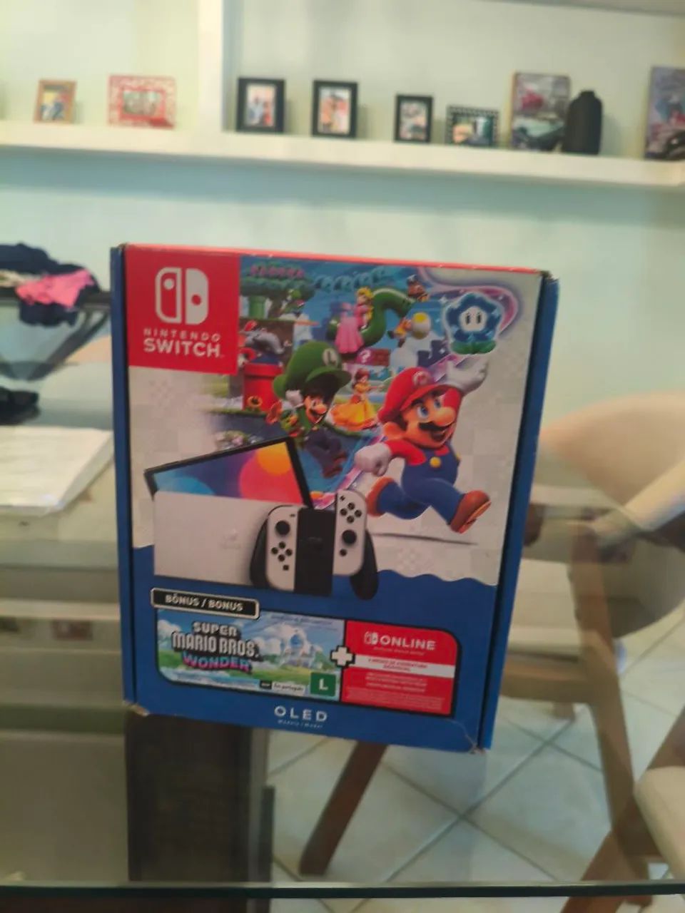 Nintendo swich oled (quebrado) com caixa