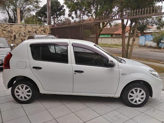 Sandero 2013 expression 1.0,impecável,90mkm,pneus novos,manual e chave copia - Foto 13