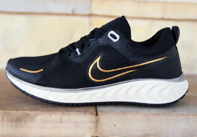 Nike legend react black best sale and gold