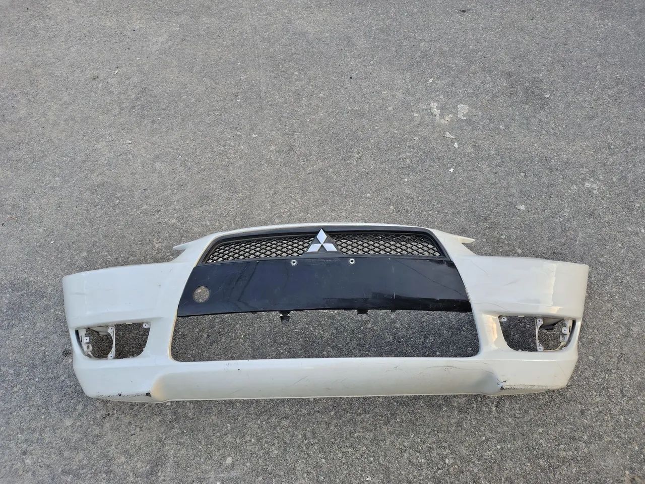 Para-choque dianteiro Mitsubishi Lancer 2011 a 2018 