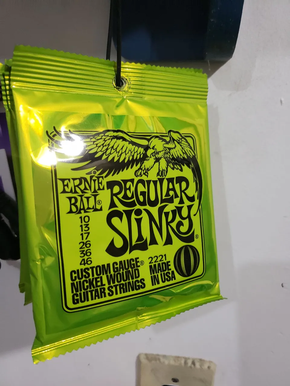 Encoordoamento Ernie Ball Regular Slinky .010 - .046