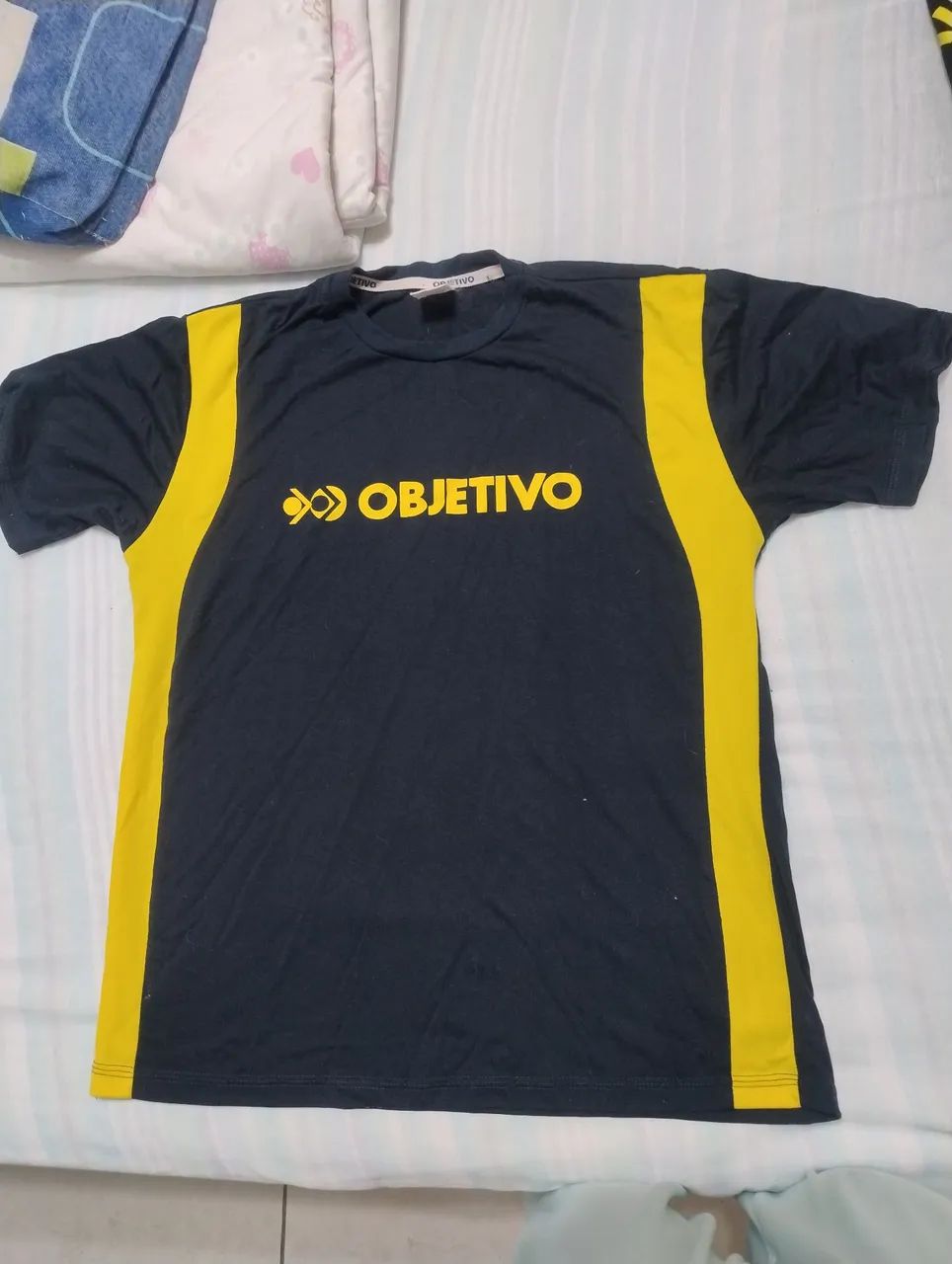 Camiseta original Objetivo 100% poliéster  - Foto 2