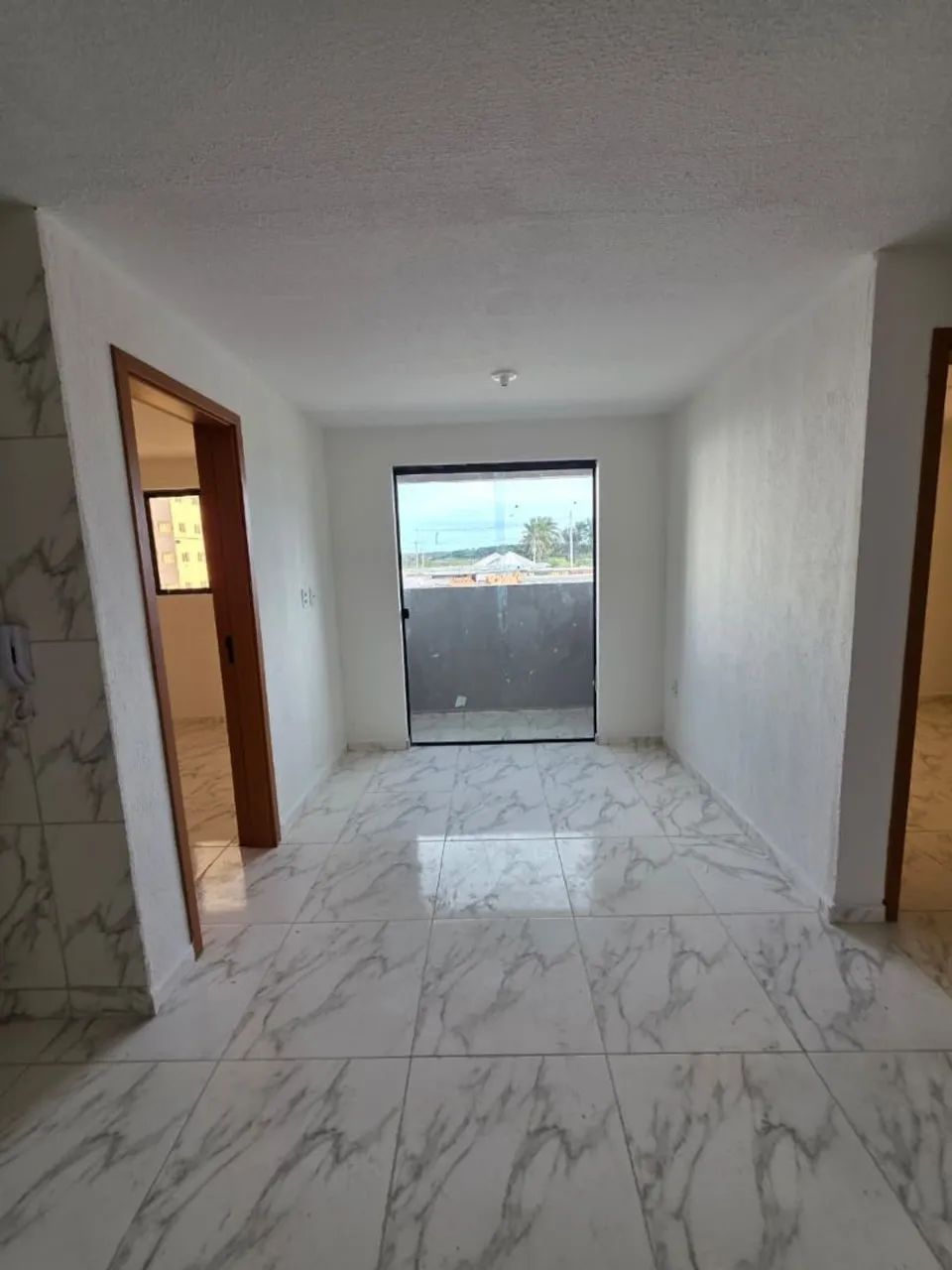 Pague sua primeira parcela com 90 dias !! Repasse apartamento terreo com varanda