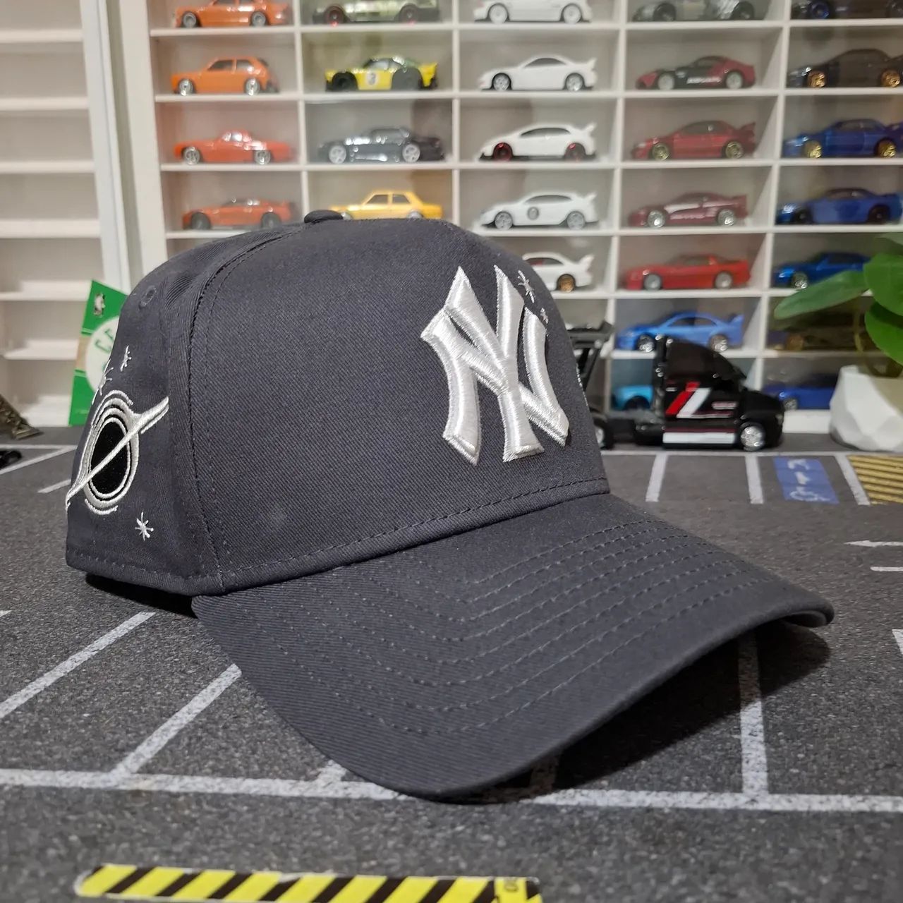 Boné New Era 9FORTY A-Frame New York Yankees MLB Planets<br>MLB