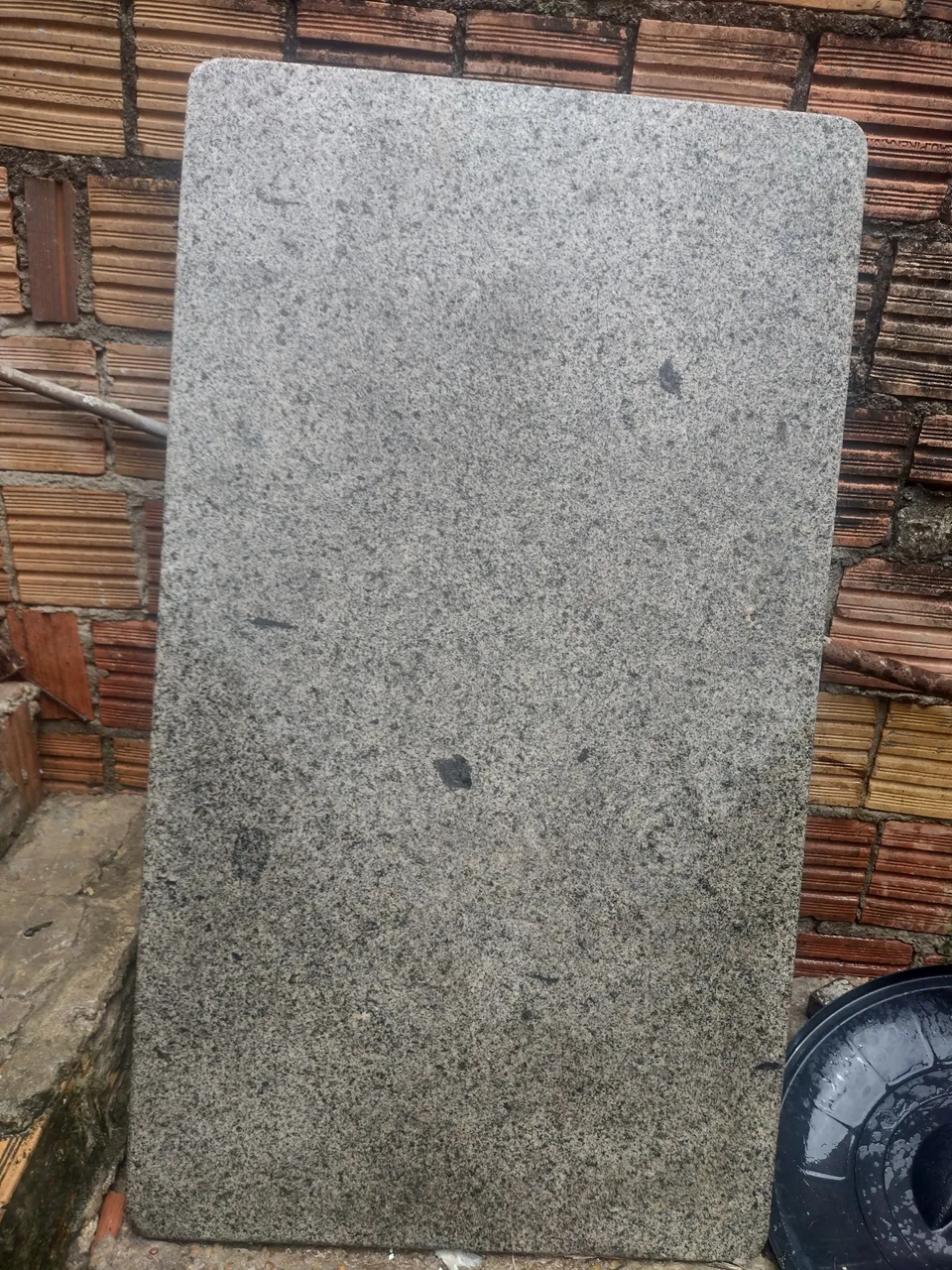 Tampo de mesa em granito