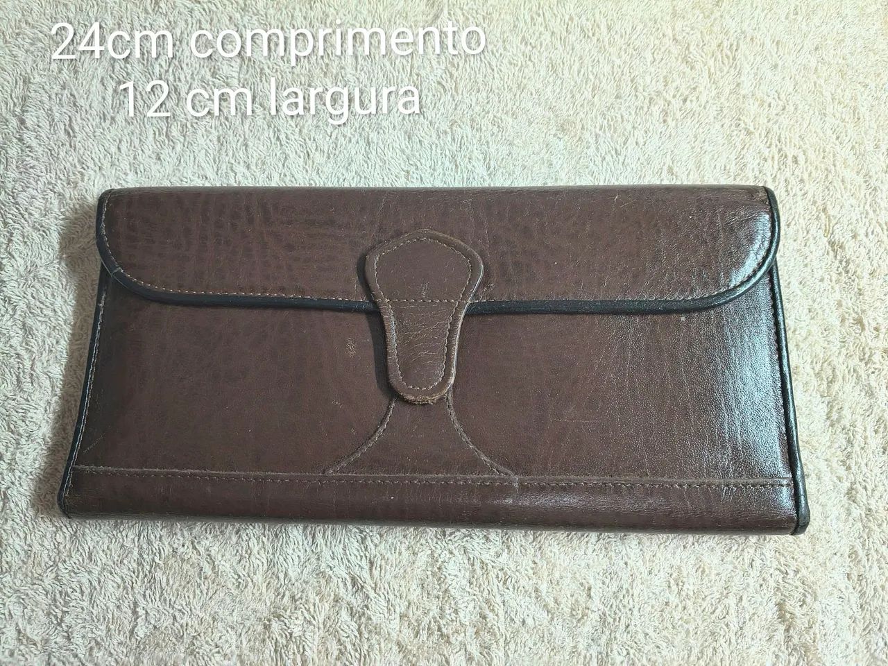 Carteira de mão em couro Ika