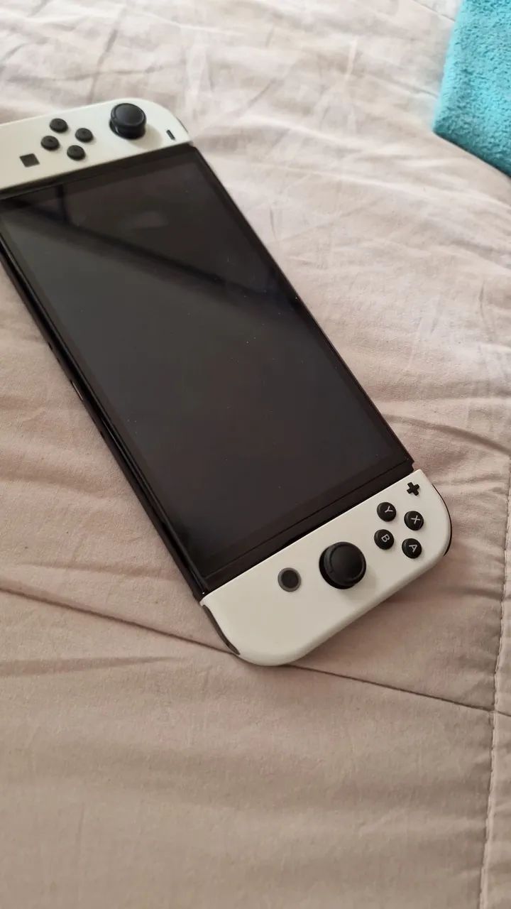Nintendo Switch OLED 64GB + maleta de transporte  - Foto 2