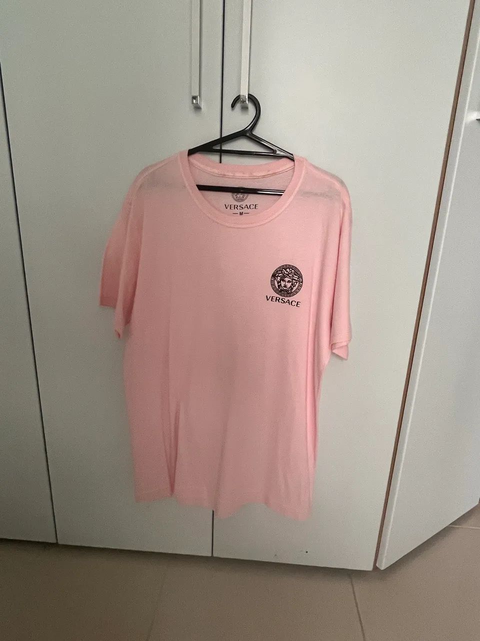 Camisa em malha TAM M super nova.