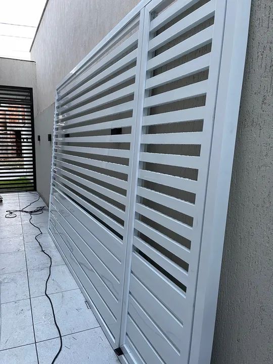 Portões de alumínio e inox, automatização e manutenção