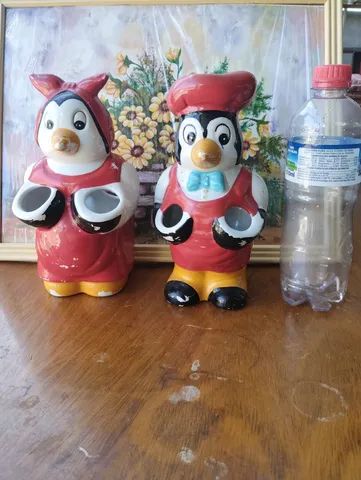 Antigo casal de pinguins em porcelana porta colher de madeira.