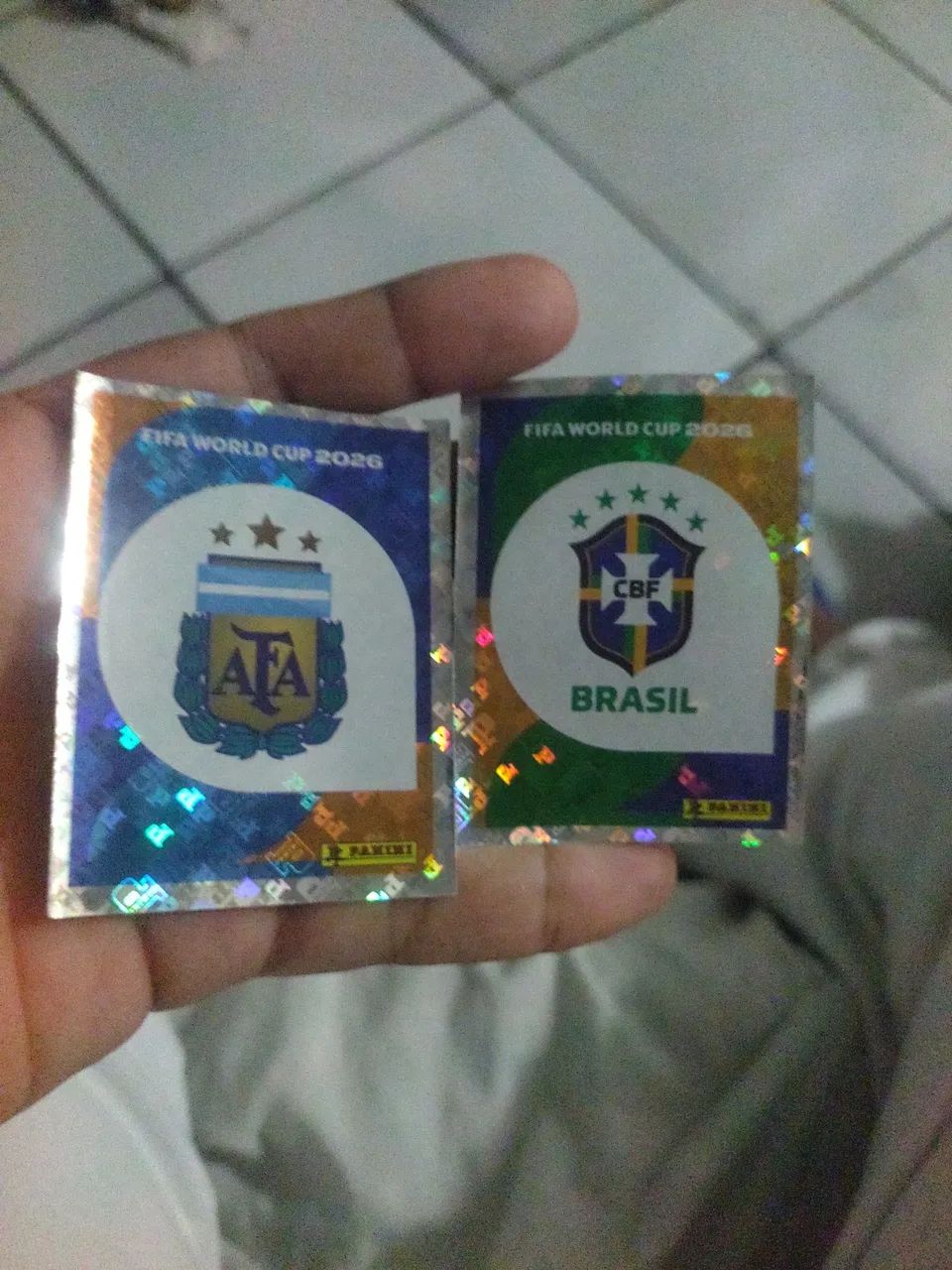 Figurinhas brilhantes Copa 2026 (Logos Brasil e Argentina) 