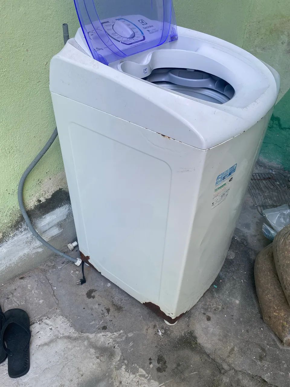Máquina de lavar com defeito 