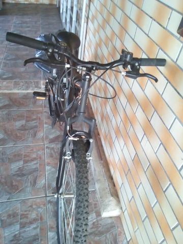 Bicicleta semi nova, com mola em excelente estado - Foto 3