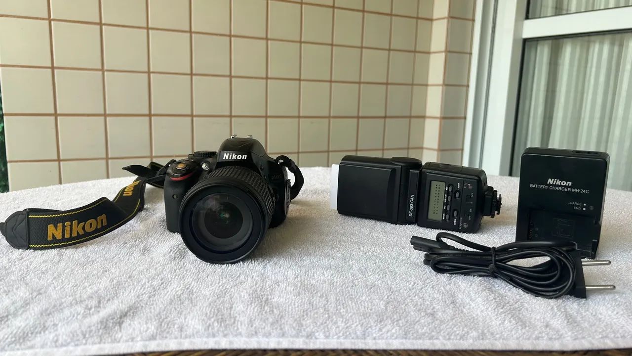 Câmera Nikon DSLR D5100 + flash vivitar - Foto 5