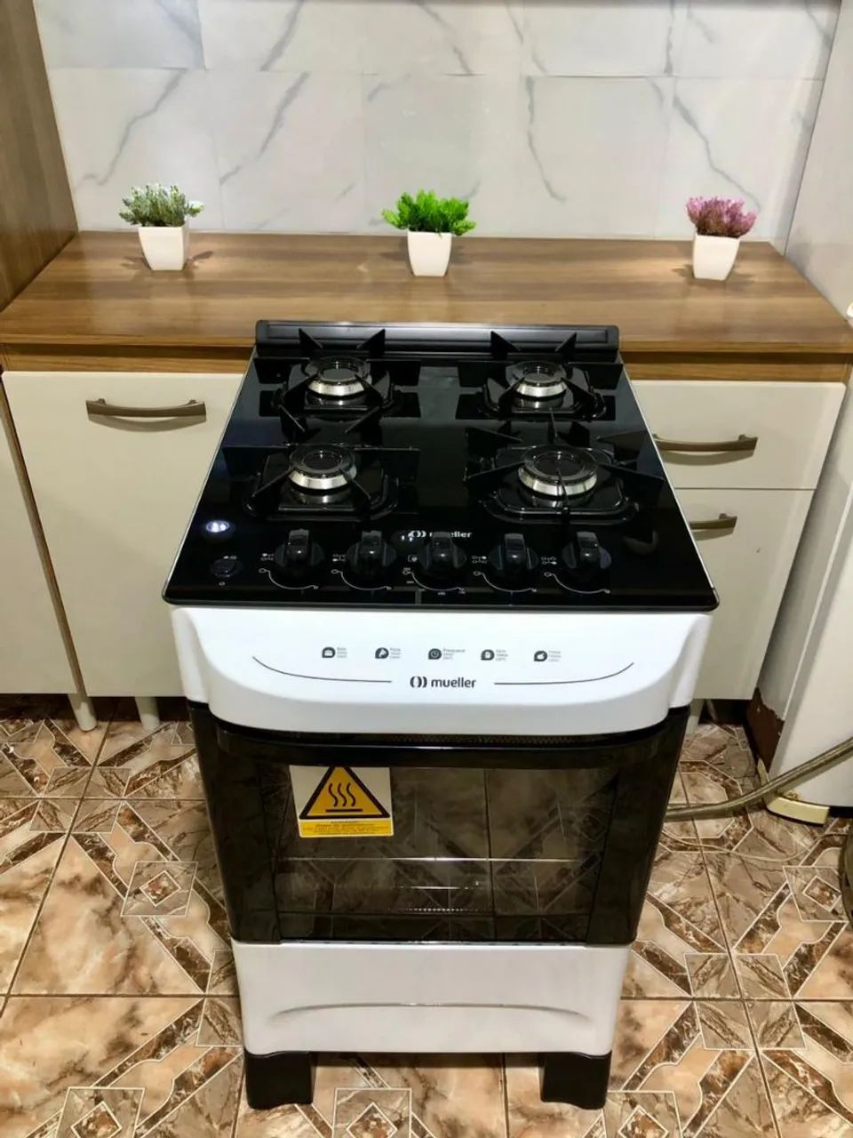 Vendo fogão modelo Mueller mesa de vidro de 04 BOCAS 