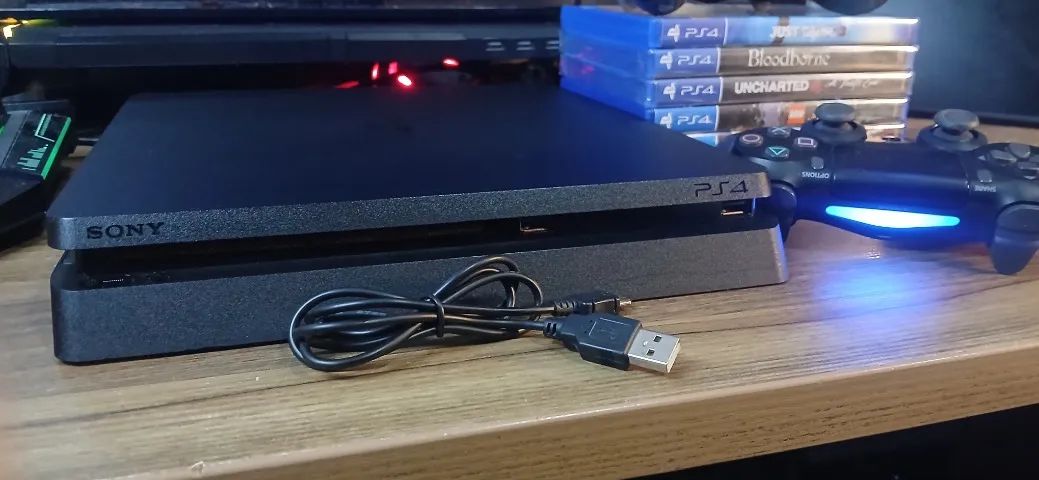 Playstation 4 (PS4) Slim + 6 jogos e 2 Controles - Foto 6