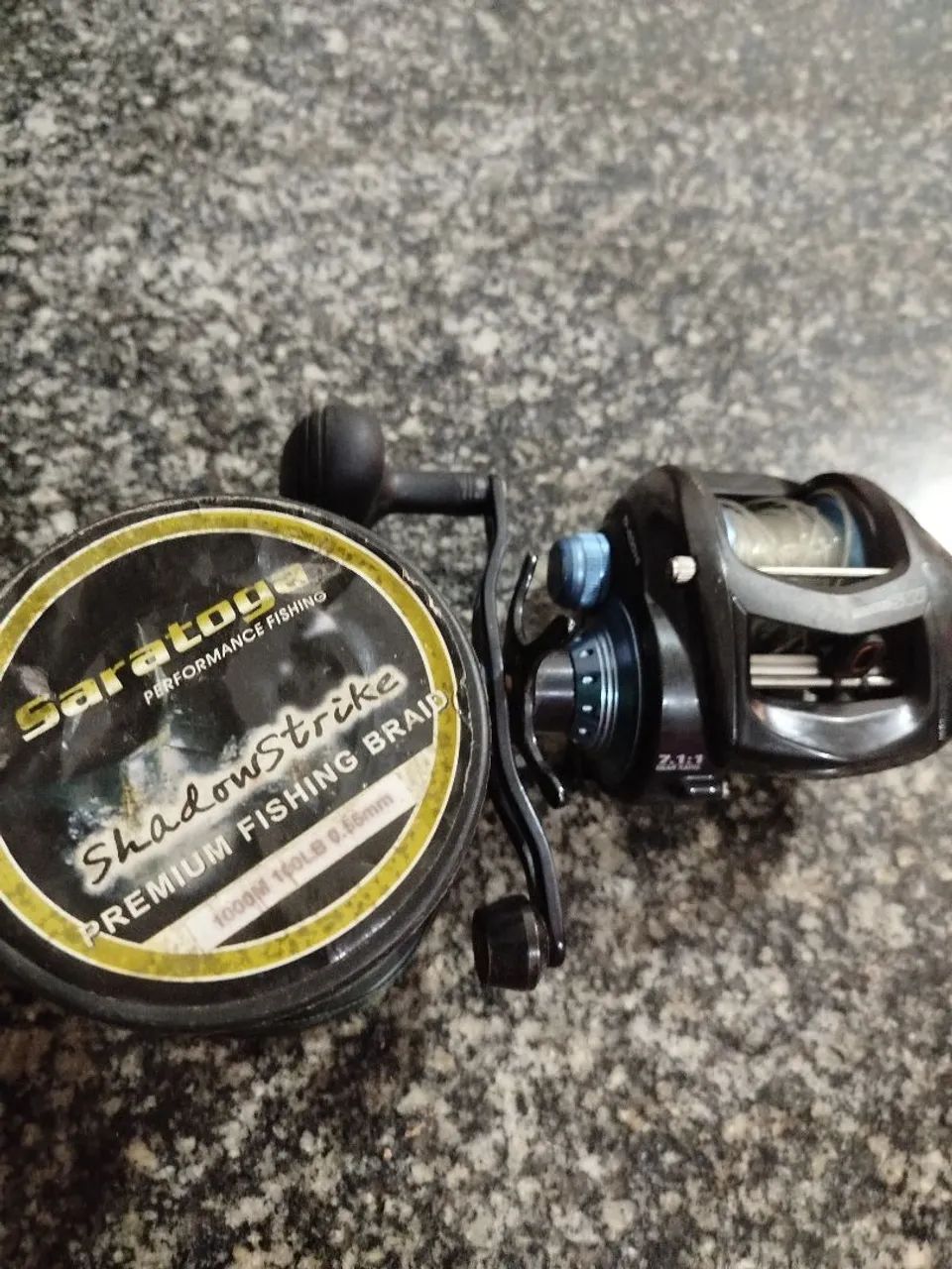 CARRETILHA DIREITA TITAN SW400 P/PEIXE DE COURO - Foto 3