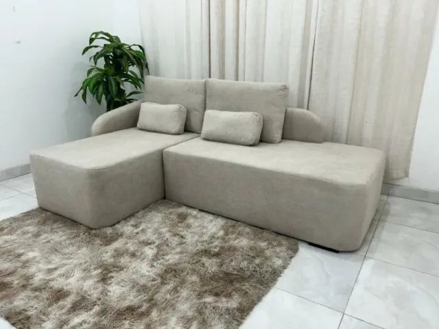 Sofá modular com design curvo e elegante, perfeito para ambientes modernos. Conforto e est