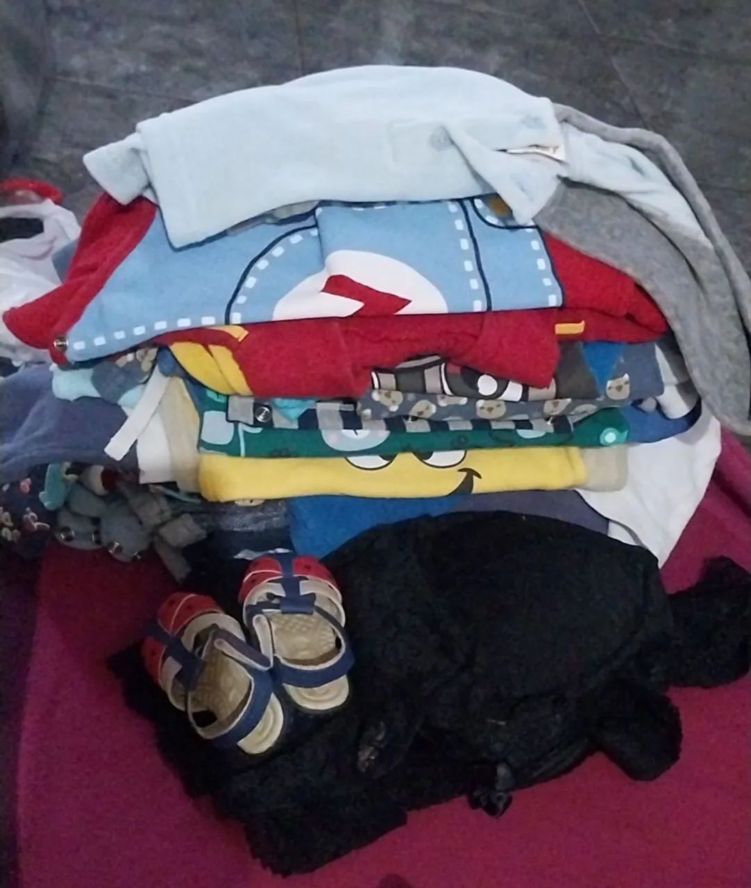 Clothes and an activity mat.. 64166868809730122