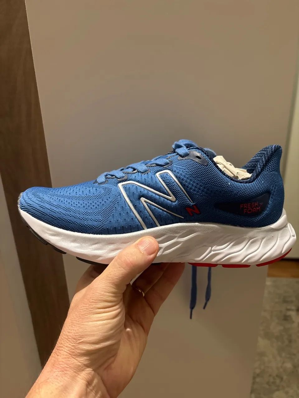 Tênis NB