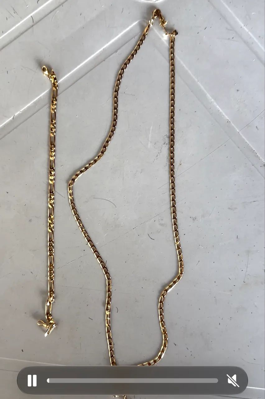 Cordão Magold e pulseira, avaliados no valor de 1980 