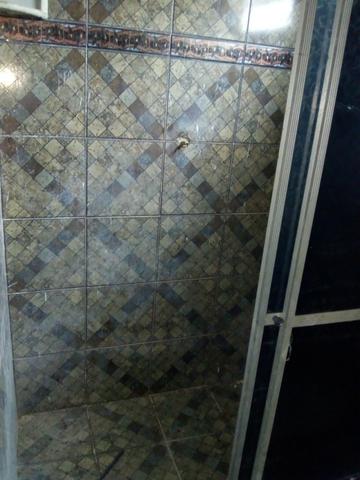 Duas casas + quintal com escritura - Foto 12